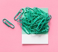 Paperclips on a piece of paper