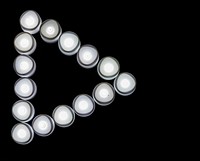 White lights play button icon