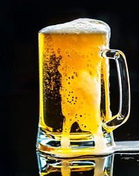 A glass of cold beer macro photography