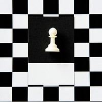 Pawn chess piece on a pattern
