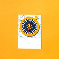 Paper craft art of a map and compass