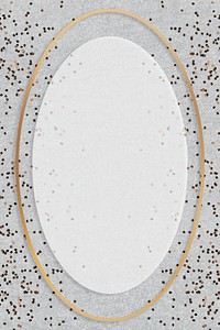 Gold shimmering oval frame design element on a gray background