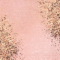 Gold glitter confetti on a pink background 