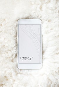 Mobile phone screen mockup on fur surface