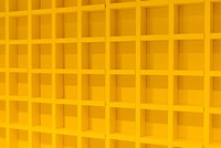 Yellow 3D wall with repetitive pattern