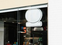 Coffee shop front with a sign mockup