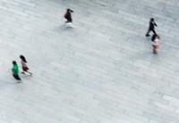 Aerial shot of people walking on the ground