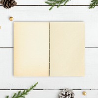 Blank notebook on a Christmas table mockup
