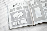 Magazine layout mockup on the floor psd