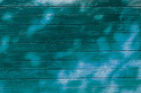 Turquoise wooden texture with shadow background image