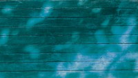 Turquoise painted wooden texture background