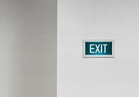 Exit signboard on a white wall