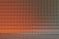 Orange product backdrop with patterned glass