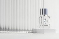 Perfume bottle mockup psd with patterned glass texture product backdrop