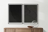 Picture frame mockups psd hanging in a minimal room