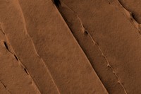 Chocolate frosting texture background close-up