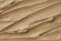 Brown frosting texture background close-up