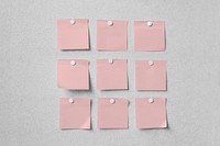 Blank pink note papers, memos on gray wall