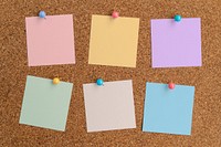 Blank memo papers, note pinned on corkboard