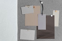 Pinned paper tag, blank notes on gray board