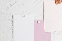 Pinned paper tag, blank notes on textured white background