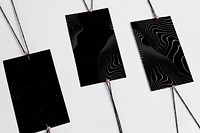 Black label tags with strings, abstract pattern