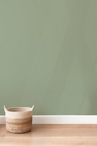 Green psd wall mockup with rattan basket