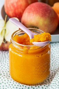 Homemade carrot puree baby food in a jar