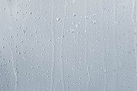 Water texture background, rainy window on cloudy day