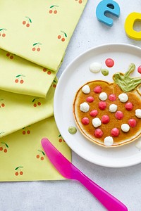 Kids pancake breakfast treat, shaped like a fun strawberry