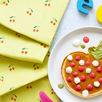 Kids pancake breakfast treat, shaped like a fun strawberry