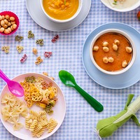 Kids food, carrot soup and chicken soup