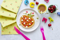 Kids pancake breakfast treat, shaped like a fun strawberry