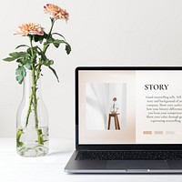 Laptop screen mockup psd, minimal workspace, pink flower decoration