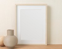 Empty picture frame, clean beige home interior decor