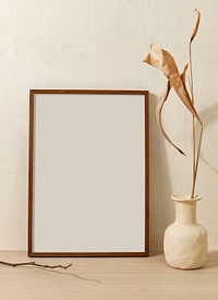 Blank photo frame, clean beige home interior decor