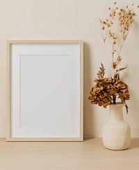 Blank picture frame, clean beige home interior decor