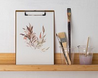 Clipboard mockup psd, vintage floral watercolor art, on a shelf