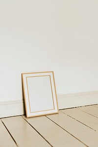 Aesthetic empty frame leaning against wall