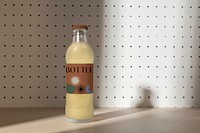 Glass bottle mockup, label design, beverage product packaging psd