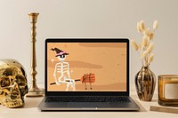 Laptop screen mockup psd, aesthetic Halloween decoration, home interior design