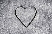 White powder background, heart shape design