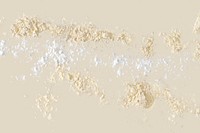 Powder texture on beige background