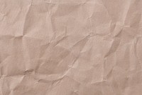 Wrinkled brown paper texture background