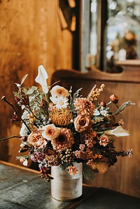 Orange flower bouquet in vase, home decor