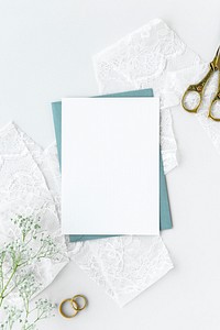 Blank white card on white lace