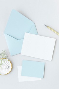 Blank blue and white cards with blue envelope
