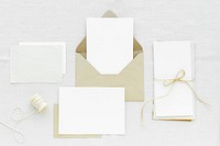 White paper note set on fabric textured background