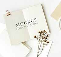 White notebook template mockup with dried plant