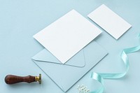 Blank card with envelope on a blue background